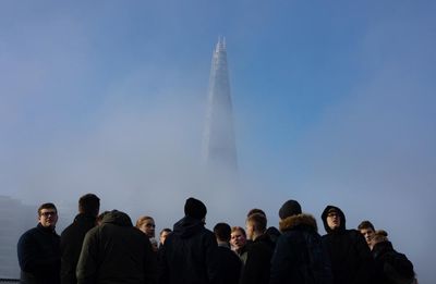 The big picture: a gaggle of visitors gather beneath London’s Shard