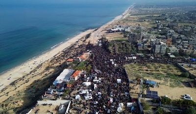 Middle East: Tens of thousands of Palestinians begin journey home to devastated northern Gaza – as it happened