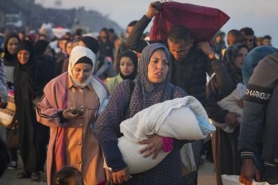 Palestinians Return To Heavily Destroyed Gaza Strip After Ceasefire