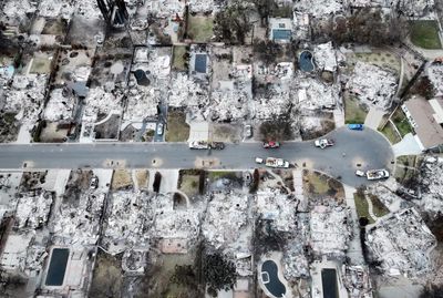 California rainstorms aid firefighters but bring ash, mud and debris in burn areas