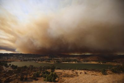 California rains help douse wildfires but risk toxic runoff, mudslides