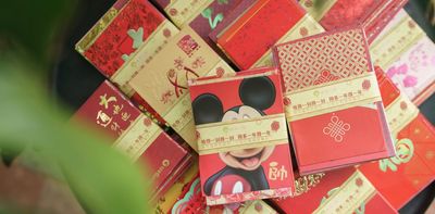 What is the story of hongbao, the red envelopes given out at celebrations like Lunar New Year?