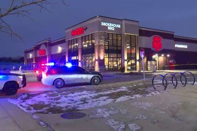 Shooting at Indiana store leaves 3 dead, including the suspect, and 2 officers wounded