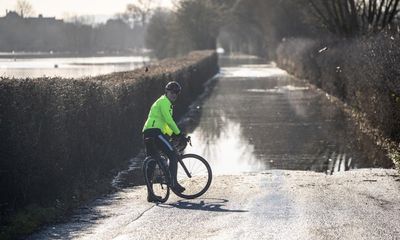 UK weather: homes evacuated as rain and wind continue to batter England and Wales