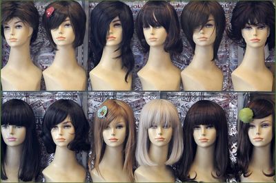 Array Of Wigs' Seized From Elderly Woman Accused Of Taking Citizenship Tests For More Than A Dozen Applicants