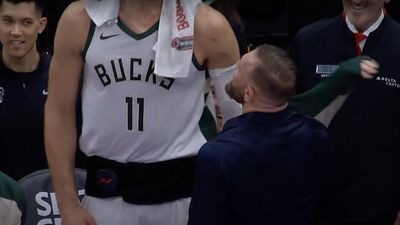 Conor McGregor Stops By Bucks Bench to Size Up Brook Lopez in the Middle of a Game