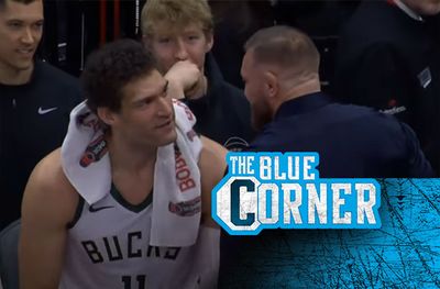 Conor McGregor, Brook Lopez size each other up before courtside faceoff in middle of NBA game