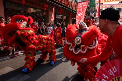 Who is celebrating the Chinese Lunar New Year of the Snake and how?