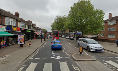 Two men arrested after teenager stabbed in east London high street