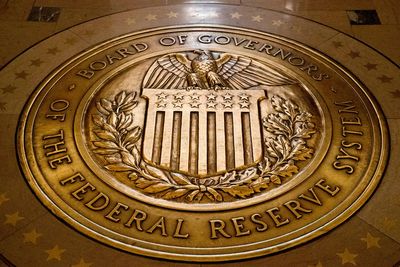 Fed hold rates steady, says job market is 'solid' while inflation 'remains somewhat elevated'