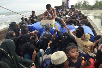 Rohingya refugees’ boat runs aground in Indonesia’s Aceh province