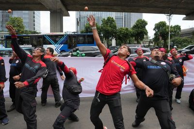 Protesters pelt Malaysian embassy with eggs over Indonesian migrant worker shooting