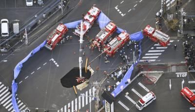 Elderly Driver Trapped In Tokyo Sinkhole Sparks Infrastructure Concerns