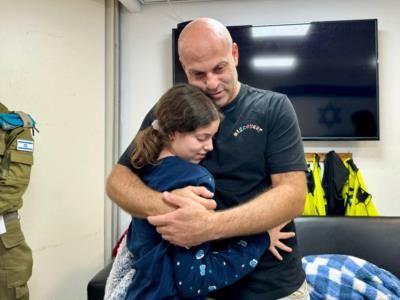 IDF Releases Photos Of Freed Hostage Reuniting With Family