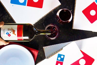 Two months after Pizza Hut introduced a branded wine, Domino's rolls out one of its own