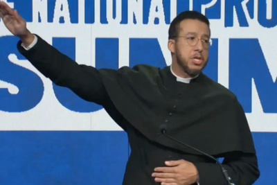 Right-wing priest loses license after 'salute' at pro-life summit