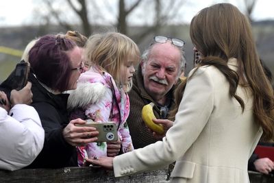 Kate takes time out to greet young fan on factory visit