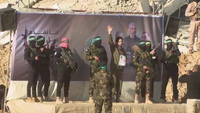 Watch: Hamas militants hand over Israeli hostages Yarden Bibas and Ofer Kalderon to Red Cross under ceasefire deal