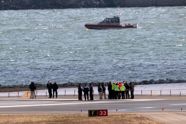 Recovery crews return to the Potomac debris after the deadly