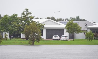 One metre of rain in 48 hours: flooding to continue in north Queensland with thousands of homes at risk