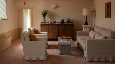 Skirted Furniture Is the 'Triple Threat' Trend That Used to Read Traditional, But Now Feels Cool and Modern
