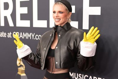 Kanye West's ex Julia Fox stuns Grammys red carpet with yellow kitchen gloves and sheer outfit