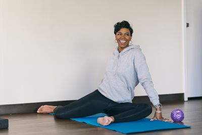 These two stretches will "life-proof" your hips if you sit all day, according to an expert trainer