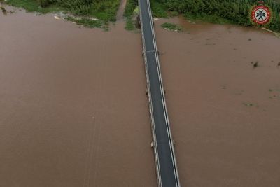 One dead and major bridge collapses after Australia’s flood worsens