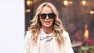 Amanda Holden perfectly blends comfort with chic in wide leg satin trousers and cosy knit jumper