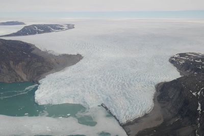 Greenland ice sheet cracking open quicker than before, say scientists