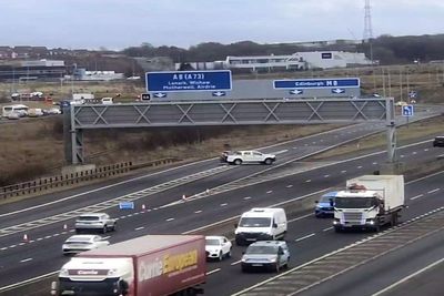 Police close motorway in hunt for ’man with weapon’