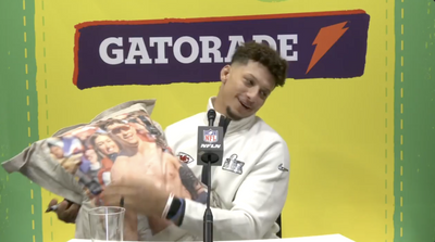 Patrick Mahomes hilariously signed a dad bod pillow during Super Bowl Opening Night