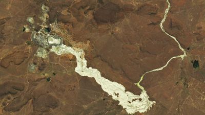 Earth from space: Golden river of toxic waste spills out from deadly mining disaster in South Africa