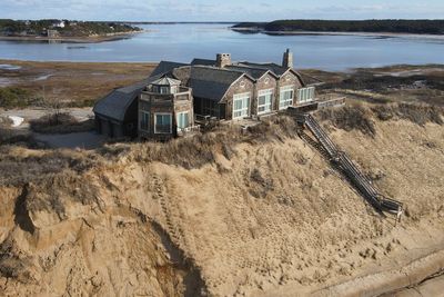 A huge luxury home is about to fall into the sea and nobody knows what to do with it