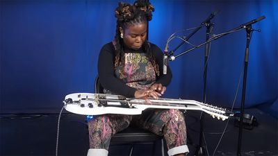 “People say, ‘You’re playing the guitar on your lap, you learned from Guitar Hero.’ But it’s taken years to figure out how to write complex compositions”: Yasmin Williams brings lap-tapping and double-neck guitar to late-night TV with Colbert performance