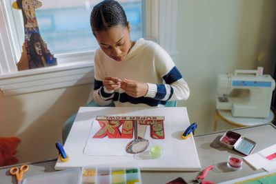Super Bowl artist weaves Black Masking culture into vibrant logo and theme art for NFL global stage