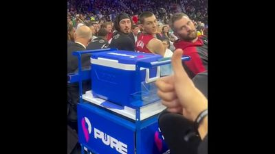 Cameras Caught Fan Breaking the News of Jimmy Butler Trade to Heat Bench in Real Time