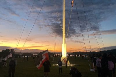 Protests and a New Zealand leader's absence overshadow a day marking the founding treaty with Māori