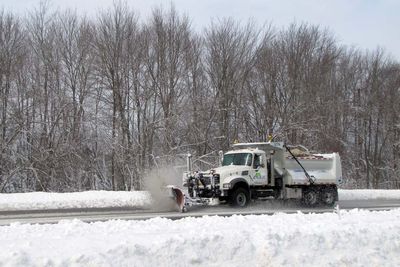 Northeast battered by winter storm bringing slush and snow causing havoc for commuters