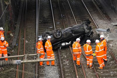 Major train line blocked after 'drunk-driver' crashes car onto tracks