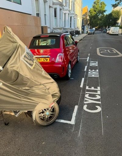 Man fined after e-bike hire bay painted round his car on London street while on business trip