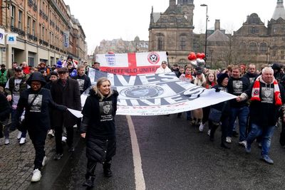 Hundreds gather for march in memory of boy, 15, stabbed to death at school