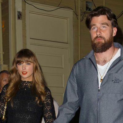 Taylor Swift Makes Her Feelings Known in Simkhai's "Joy" Mini Dress for Travis Kelce Date