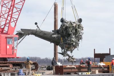 DC plane crash investigators recover Black Hawk military helicopter from Potomac