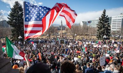 Thousands protest against Trump’s war on immigrants after Ice raids: ‘Fight for our neighbors’