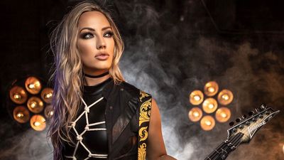 "I’ve been whipped, stabbed and had to have surgery. Most recently, I got licked on the tongue by Alice Cooper's snake." Nita Strauss shares the battle scars that shaped her into a modern guitar hero