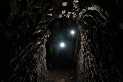 AP PHOTOS: Syrians returning to the town of Tel Rifaat find homes in ruins and underground tunnels