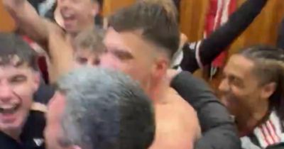 Queen's Park players celebrate in away dressing room after beating Rangers