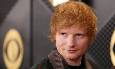 Police in India stop Ed Sheeran busking on street before concert