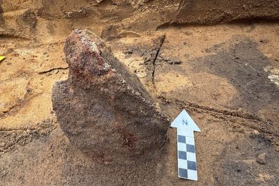 Archaeologists unearth ‘exceptionally rare’ Roman helmet buried in strange ritual